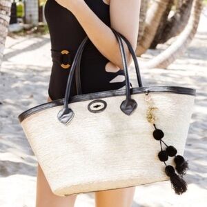 NWT Woven Straw Tote with Black Trim and Pom-Pom Charm